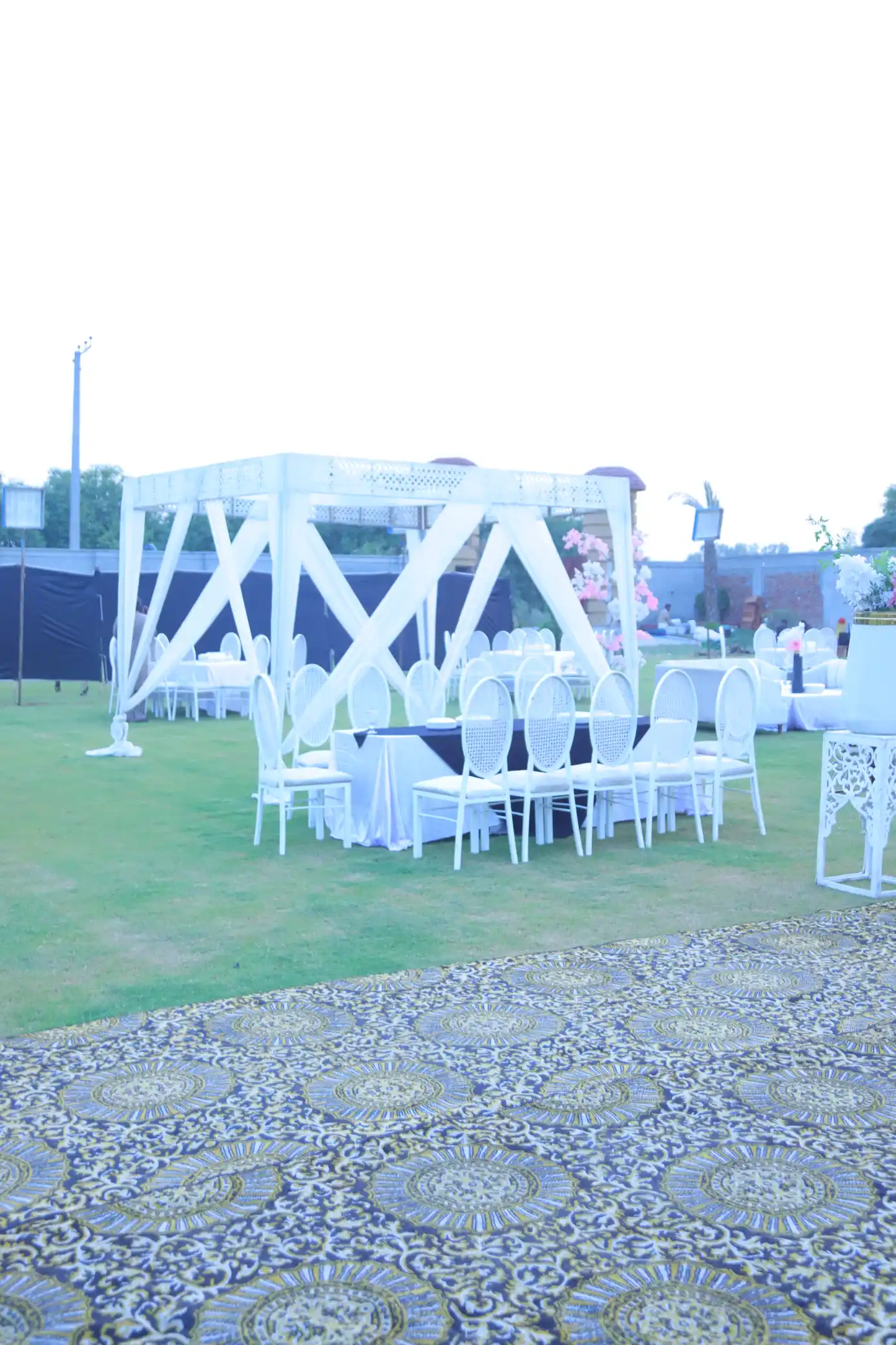 Portrait event lawn frame with decor and outdoor seating